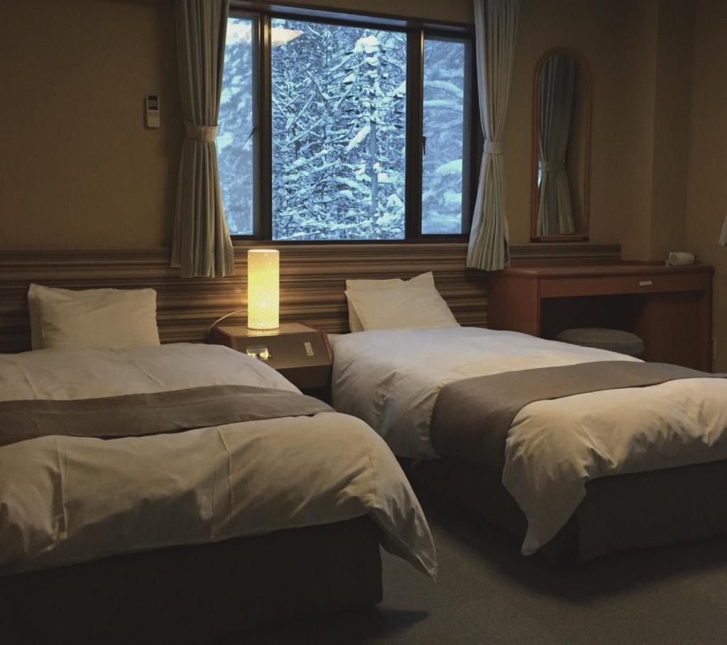 Hakuba Landmark Iwatake Lodge Eksteriør billede